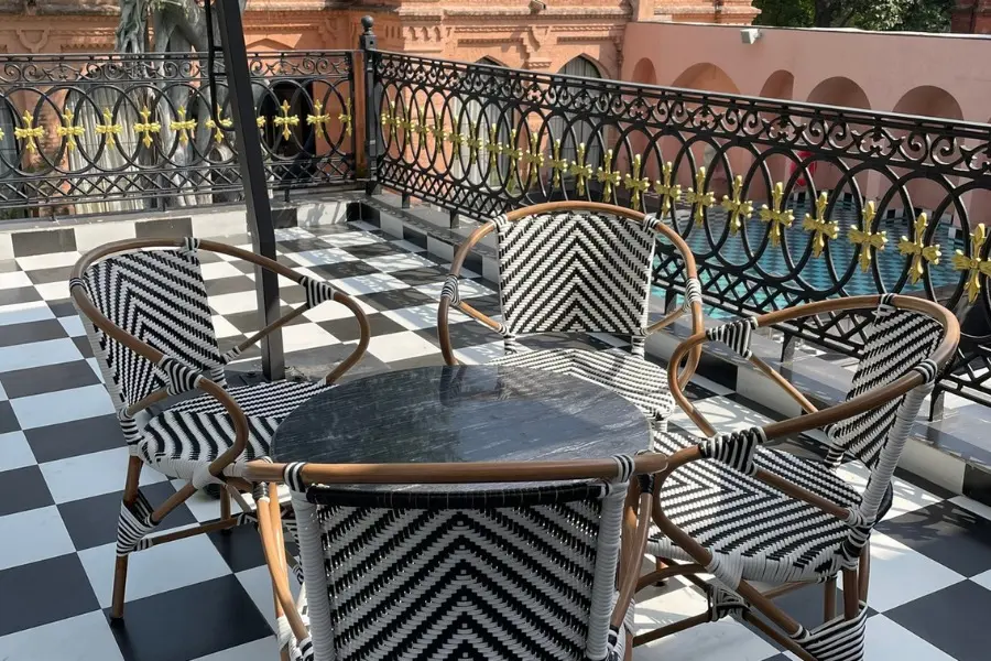 Chic terrace seating at The Earth Amritsar, offering a stylish space for relaxed gatherings and scenic views.